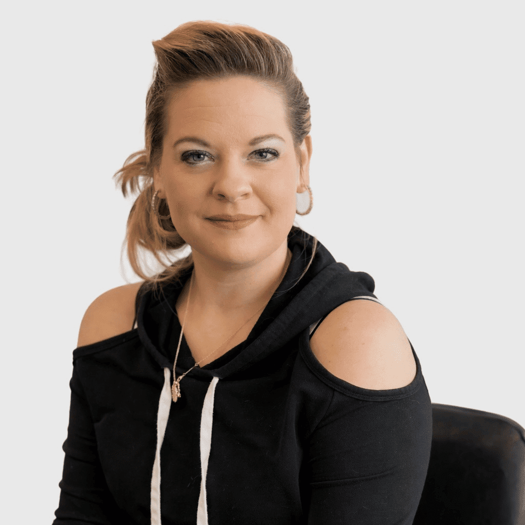 Portrait of Julie, a professional stylist at LookAfter Hair, showcasing their expertise and style.