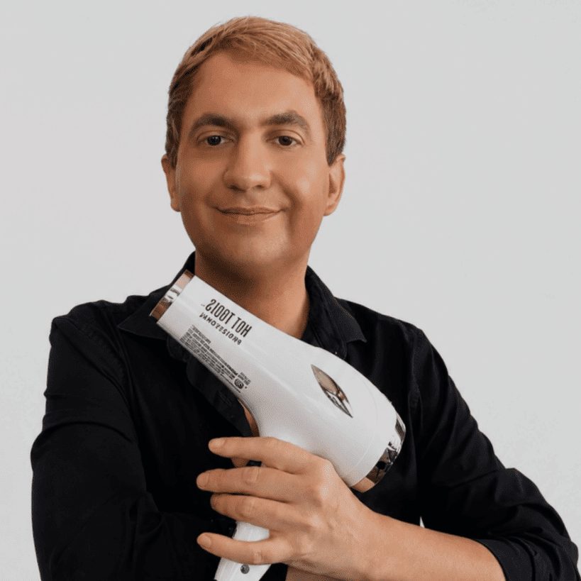 Portrait of John, a professional stylist at LookAfter Hair, showcasing their expertise and style.