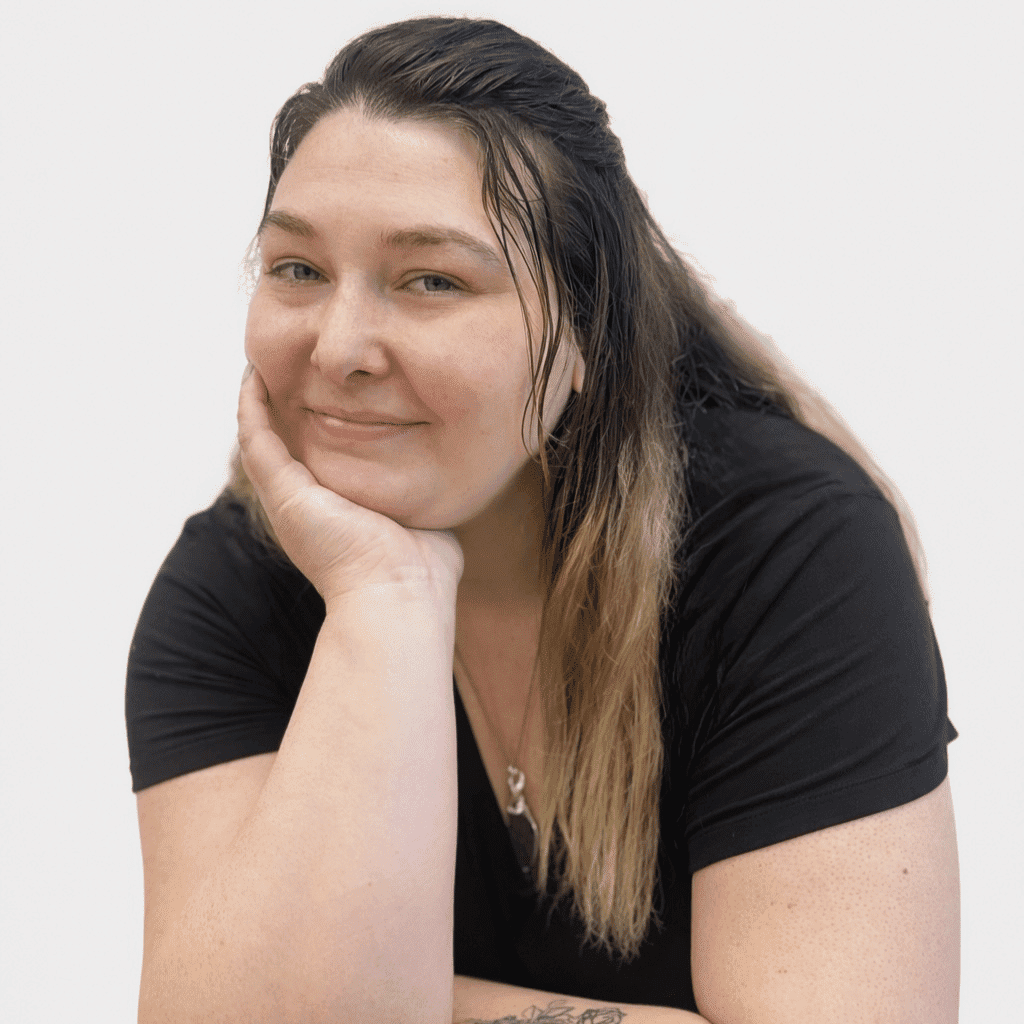 Portrait of Korhen, a professional stylist at LookAfter Hair, showcasing their expertise and style.