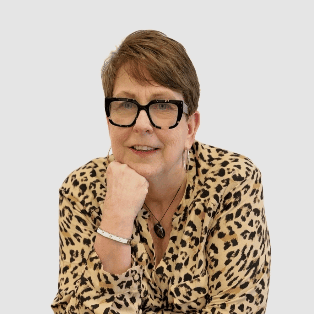 Portrait of Lynda, a professional stylist at LookAfter Hair, showcasing their expertise and style.