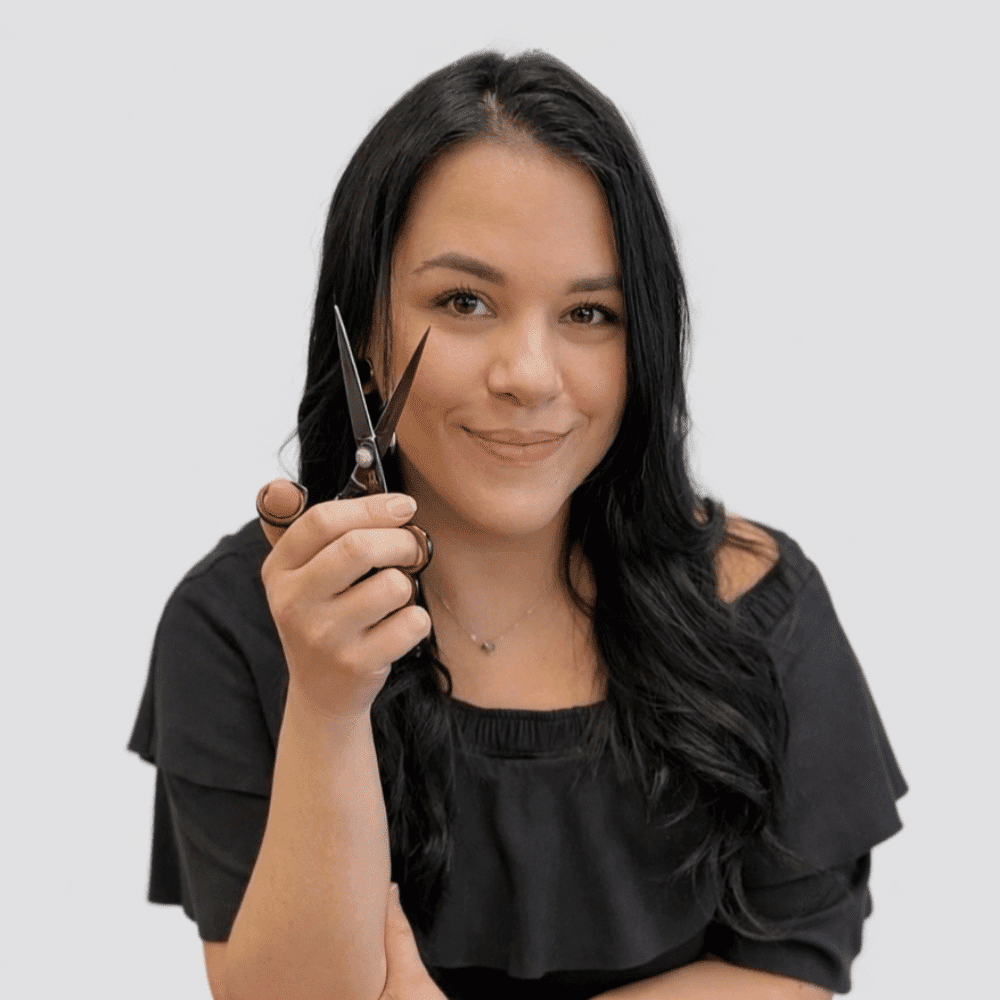 Portrait of Eve, a professional stylist at LookAfter Hair, showcasing their expertise and style.