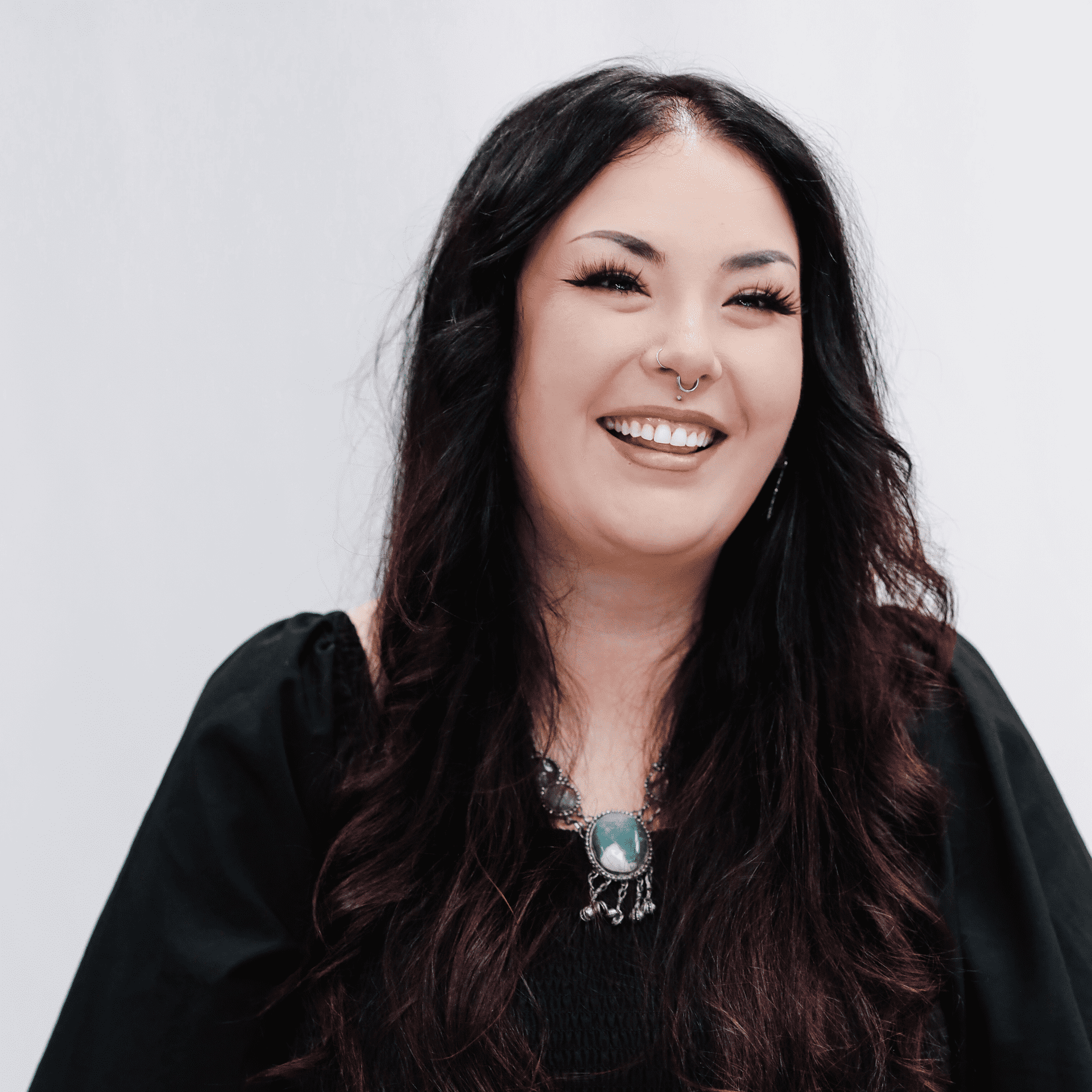 Portrait of Rachel, a professional stylist at LookAfter Hair, showcasing their expertise and style.