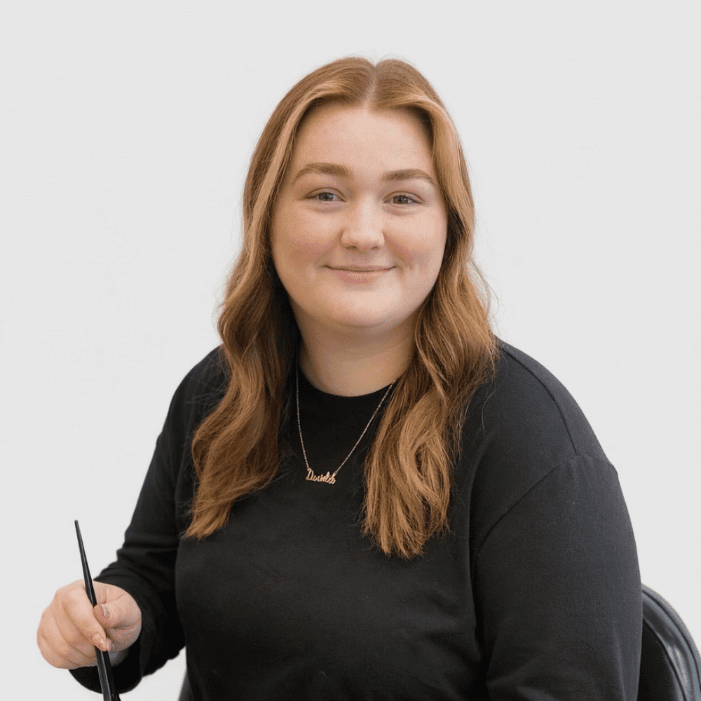 Portrait of Danielle, a professional stylist at LookAfter Hair, showcasing their expertise and style.