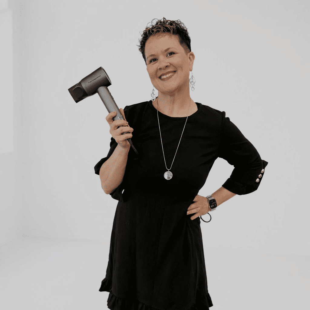 Portrait of Kimberly, a professional stylist at LookAfter Hair, showcasing their expertise and style.