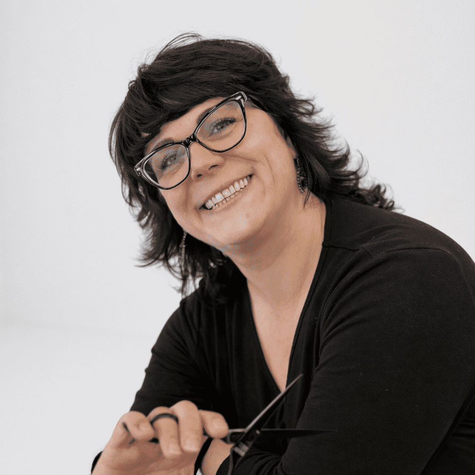 Portrait of Kristi, a professional stylist at LookAfter Hair, showcasing their expertise and style.