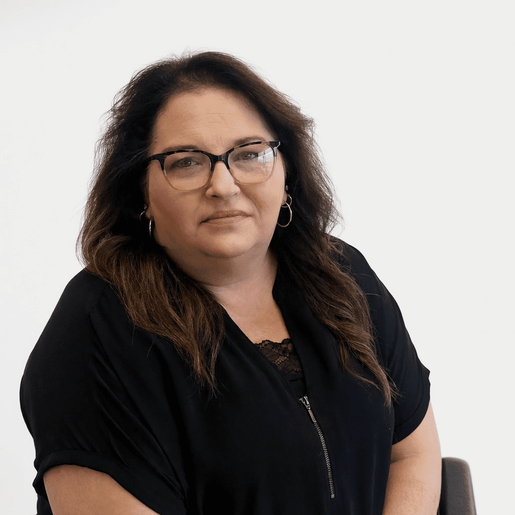 Portrait of Kristie, a professional stylist at LookAfter Hair, showcasing their expertise and style.