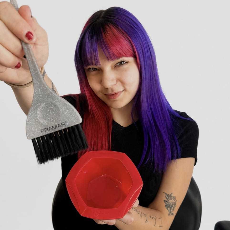 Portrait of Cassie, a professional stylist at LookAfter Hair, showcasing their expertise and style.