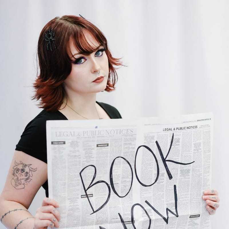Portrait of Ella, a professional stylist at LookAfter Hair, showcasing their expertise and style.