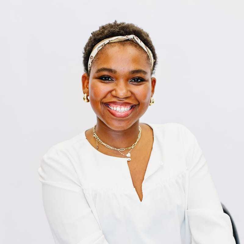 Portrait of Lolo, a professional stylist at LookAfter Hair, showcasing their expertise and style.