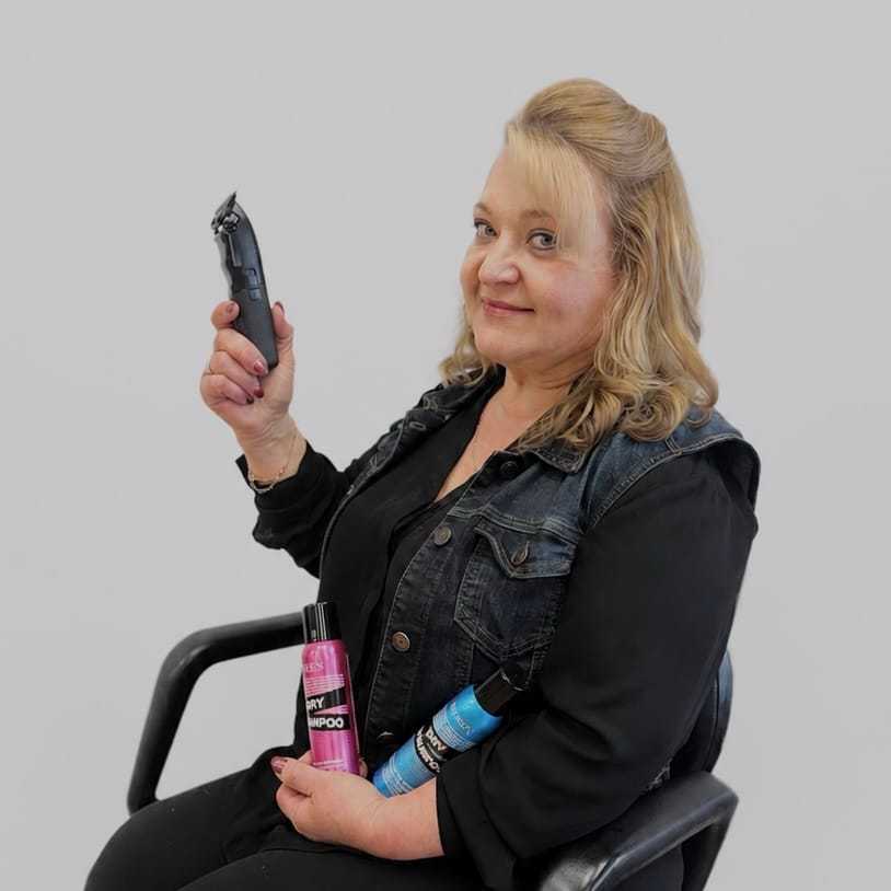 Portrait of Lana, a professional stylist at LookAfter Hair, showcasing their expertise and style.