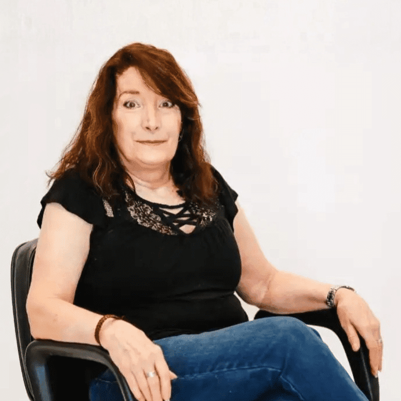 Portrait of Dana, a professional stylist at LookAfter Hair, showcasing their expertise and style.