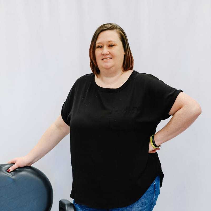 Portrait of Megan, a professional stylist at LookAfter Hair, showcasing their expertise and style.