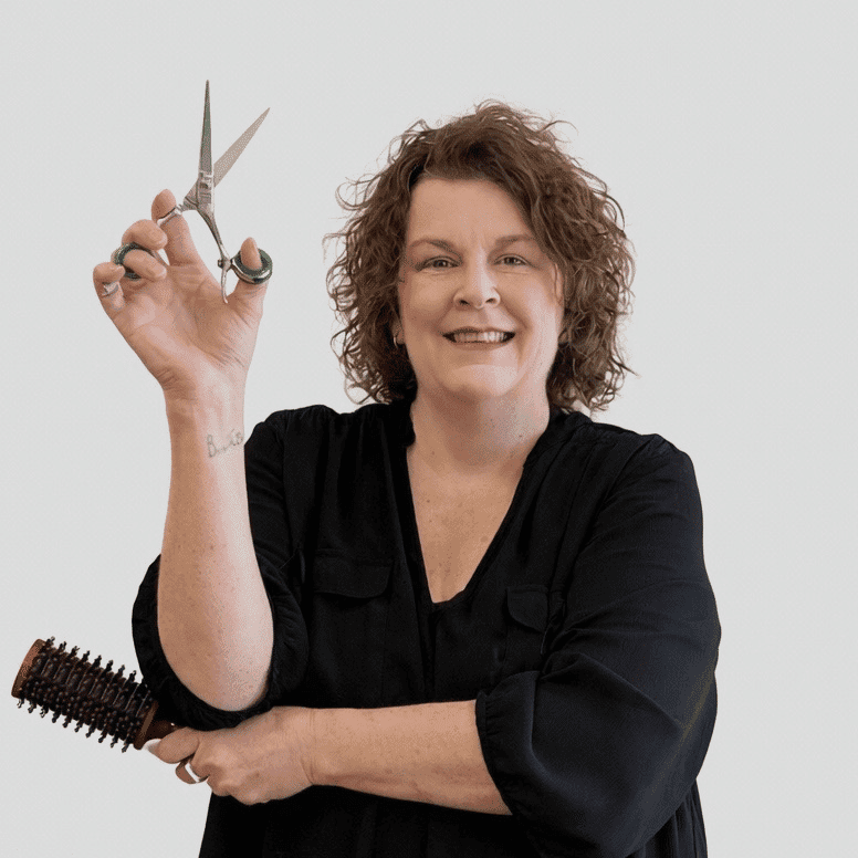 Portrait of Betsy, a professional stylist at LookAfter Hair, showcasing their expertise and style.