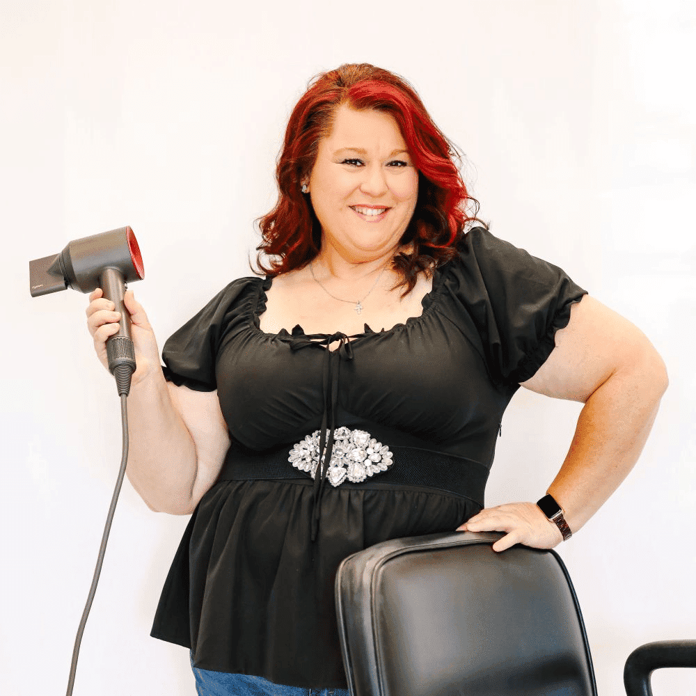 Portrait of Beth, a professional stylist at LookAfter Hair, showcasing their expertise and style.