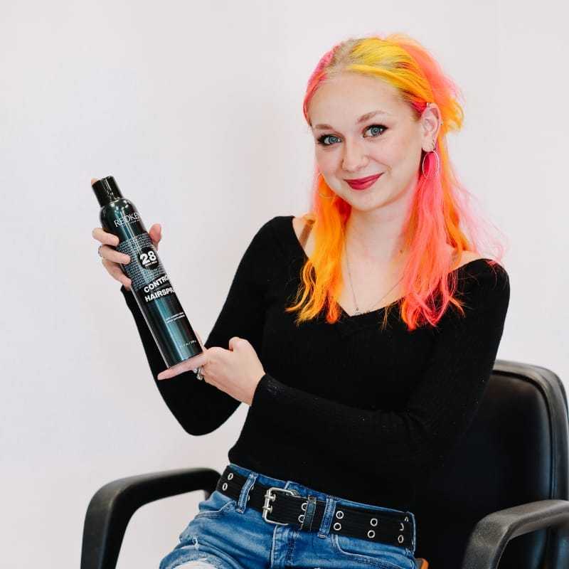 Portrait of McKayla, a professional stylist at LookAfter Hair, showcasing their expertise and style.